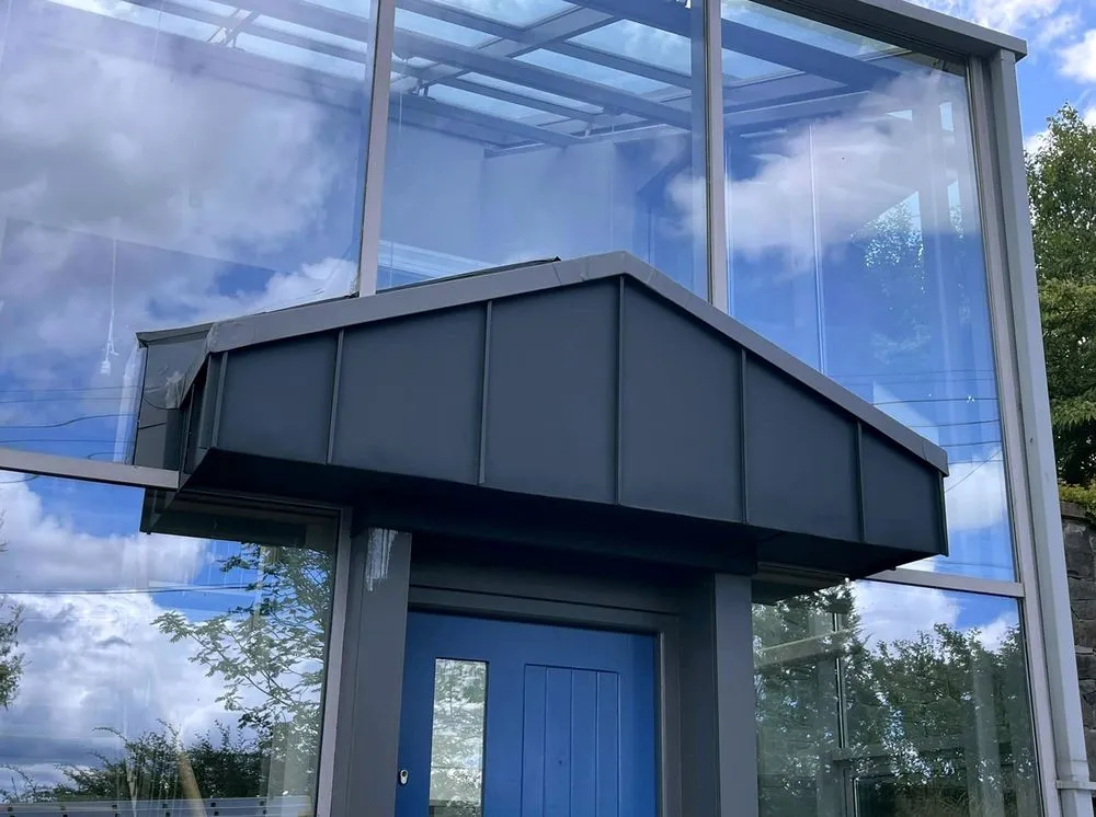 Slide of Mill Park Roofing