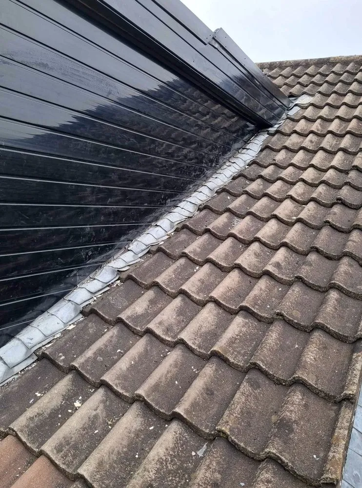 Slide of Mill Park Roofing