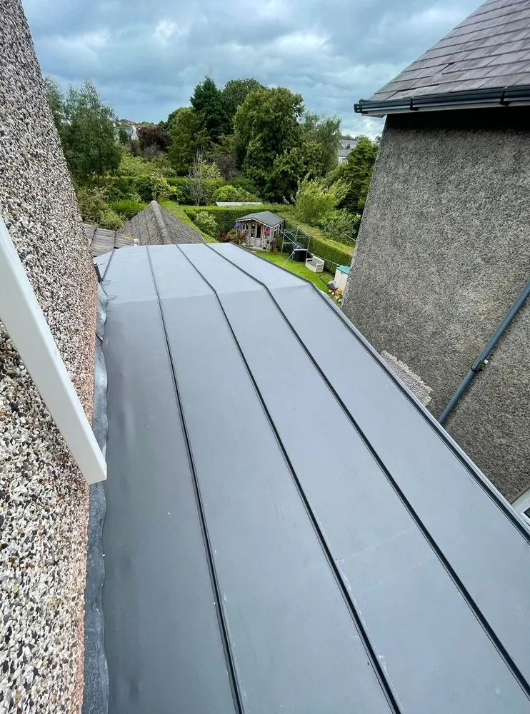 Slide of Mill Park Roofing