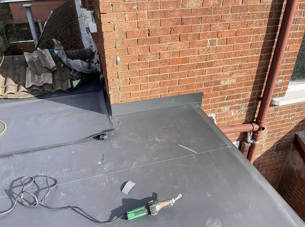 Slide of Mill Park Roofing