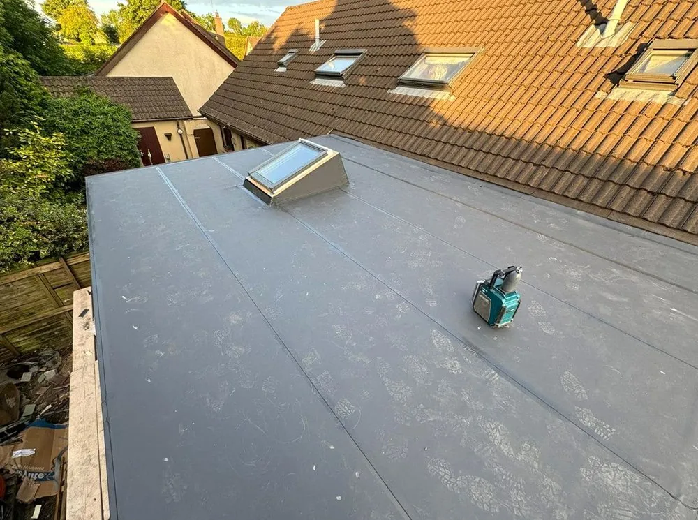 Slide of Mill Park Roofing