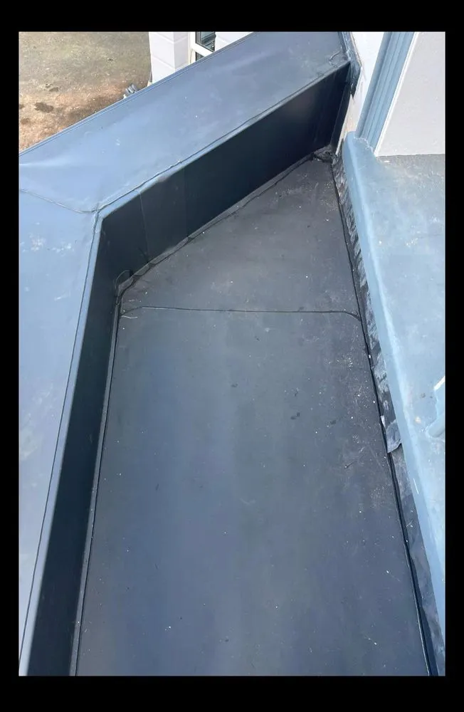 Slide of Mill Park Roofing