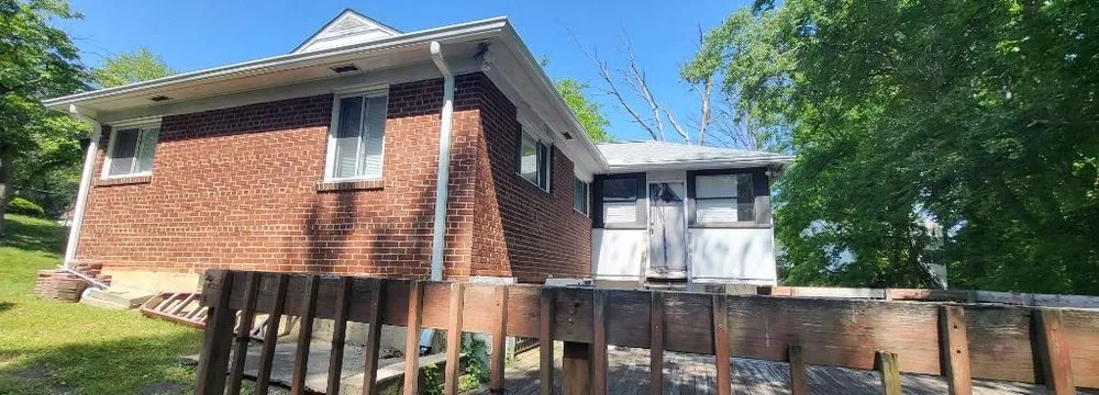 Slide of Millan Brothers Roofing & Gutters