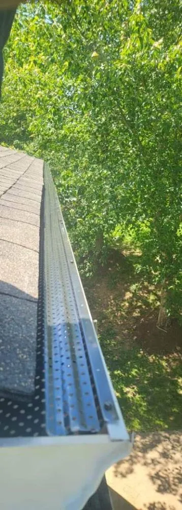 Slide of Millan Brothers Roofing & Gutters