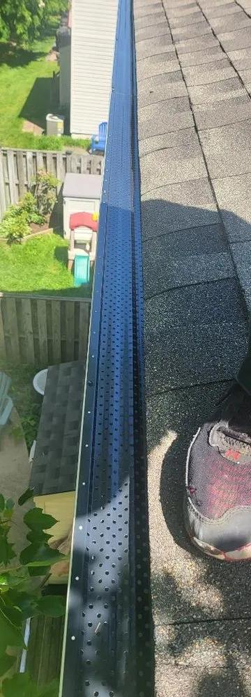 Slide of Millan Brothers Roofing & Gutters