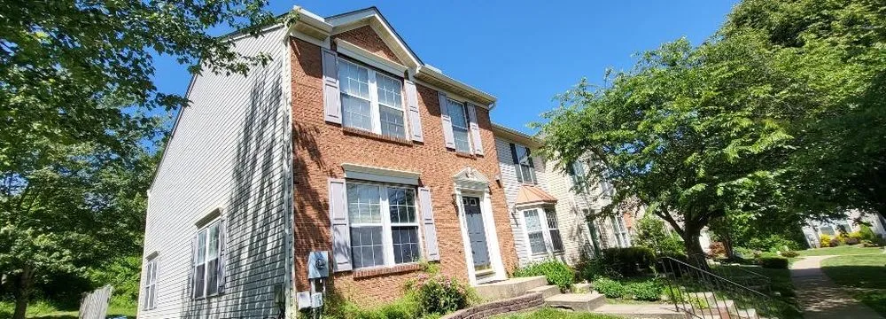 Slide of Millan Brothers Roofing & Gutters