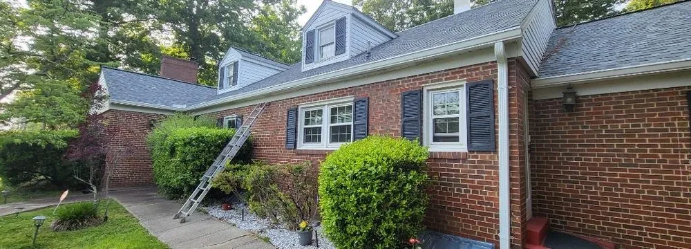 Slide of Millan Brothers Roofing & Gutters