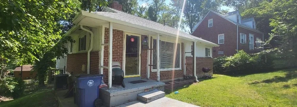 Slide of Millan Brothers Roofing & Gutters