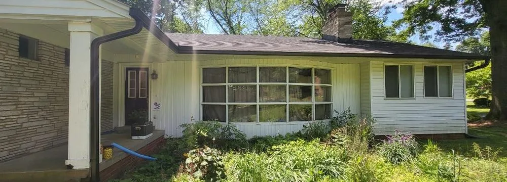 Slide of Millan Brothers Roofing & Gutters