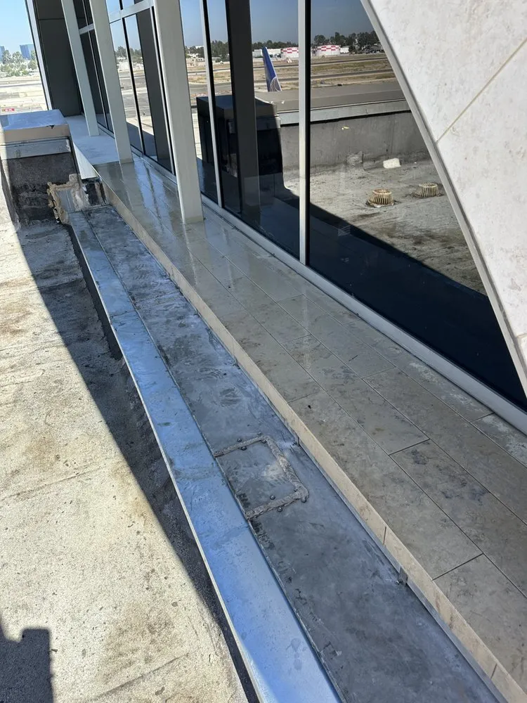 Slide of Millan Roofing Industries