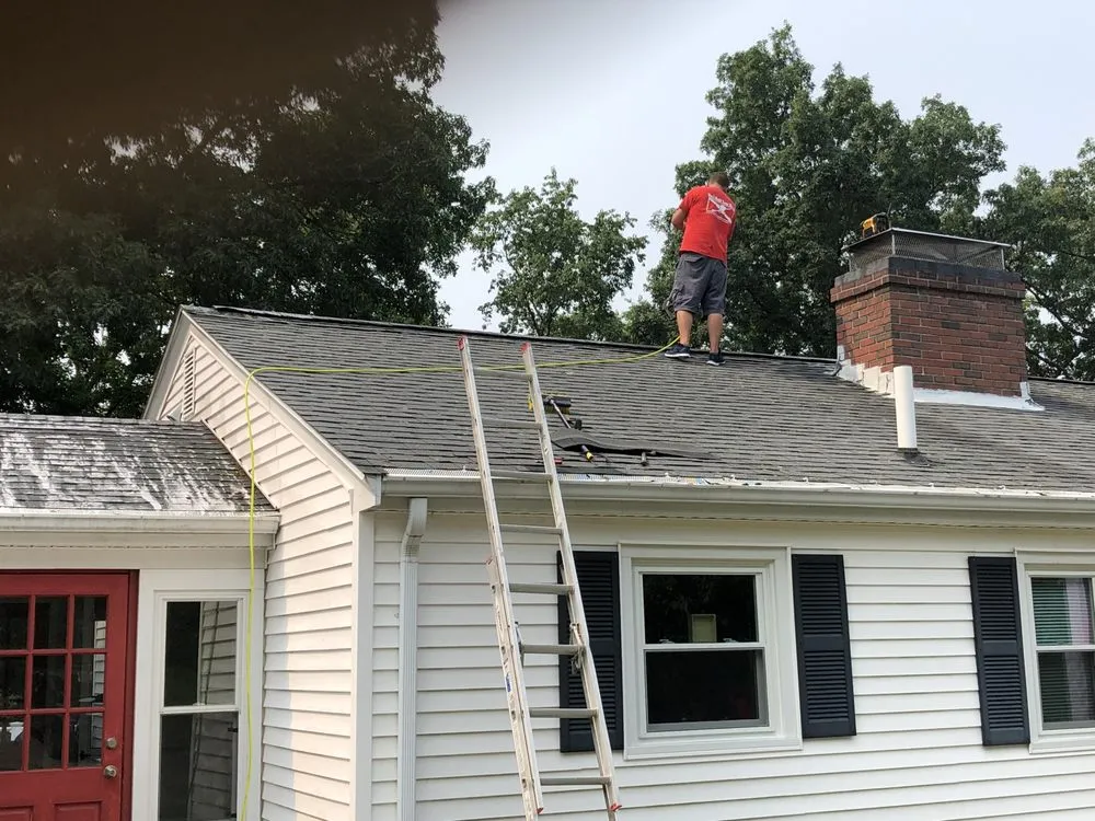 Slide of Millbury Roofing