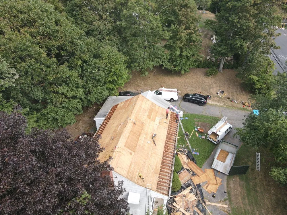 Slide of Millennials Roofing