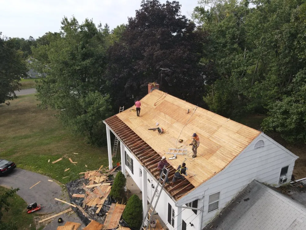 Slide of Millennials Roofing