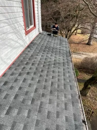 Slide of Millennium Roofing