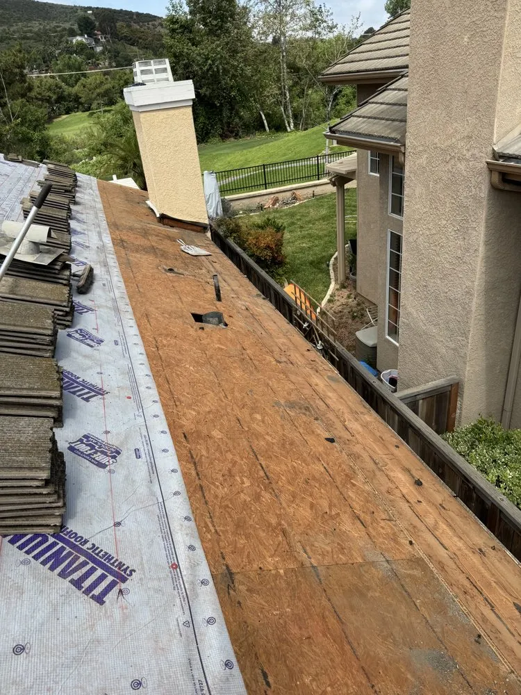 Slide of Millennium Roofing