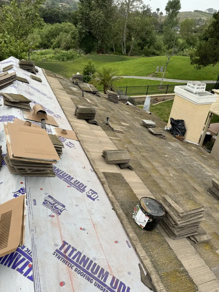 Slide of Millennium Roofing