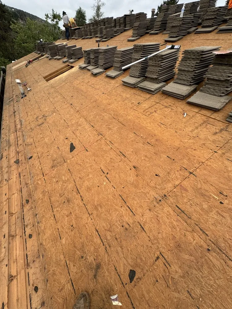 Slide of Millennium Roofing