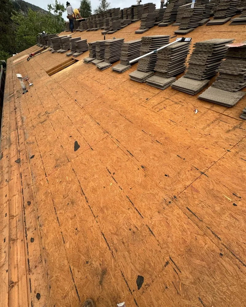 Slide of Millennium Roofing