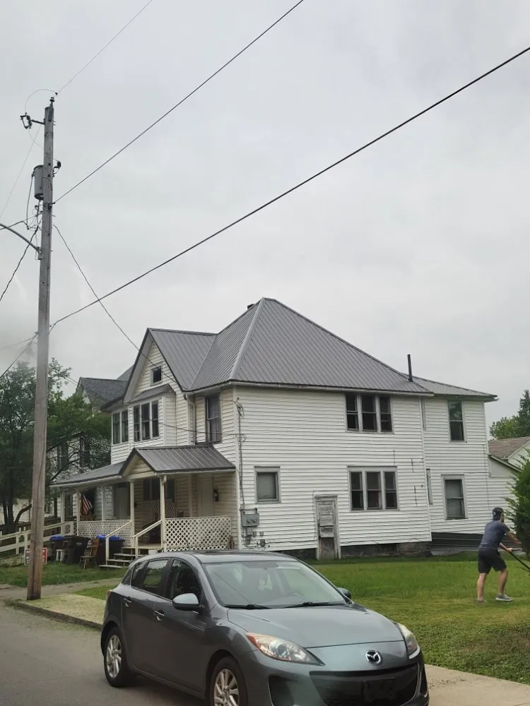 Professional shingle roofing service after storm damage in Brookfield Township, OH by Miller's Metal Roofing