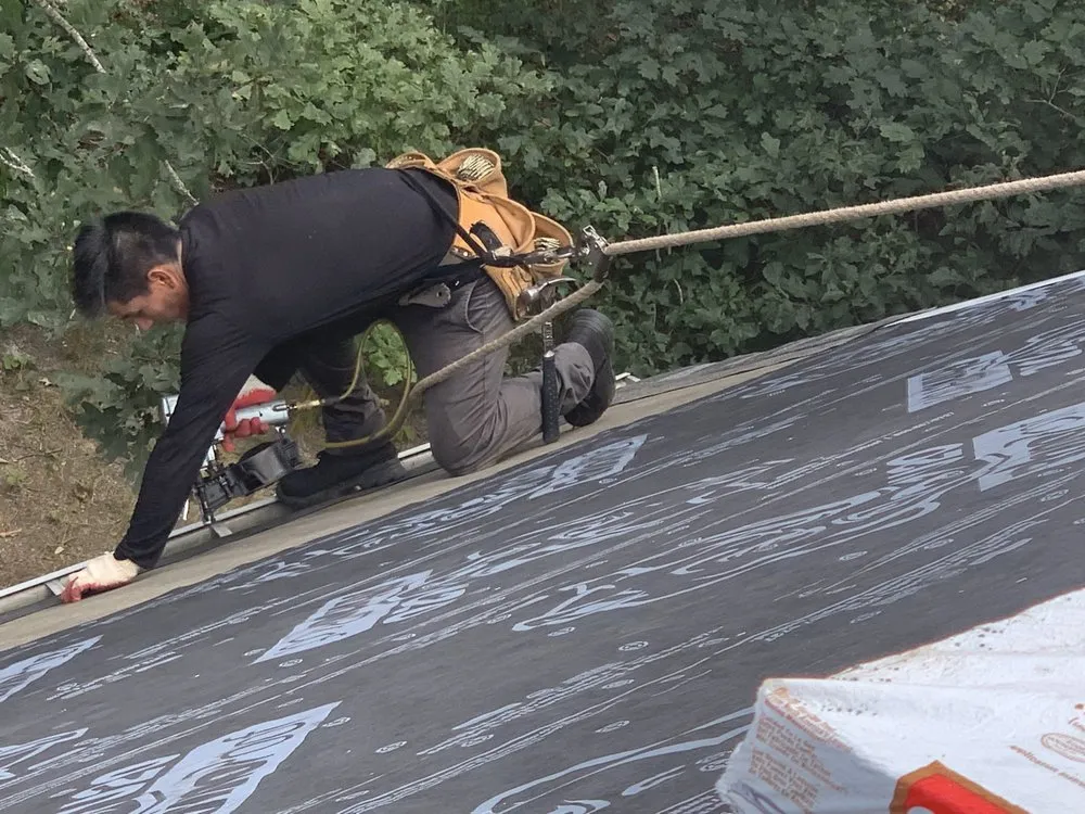 Slide of Millers Pro Roofing & Siding