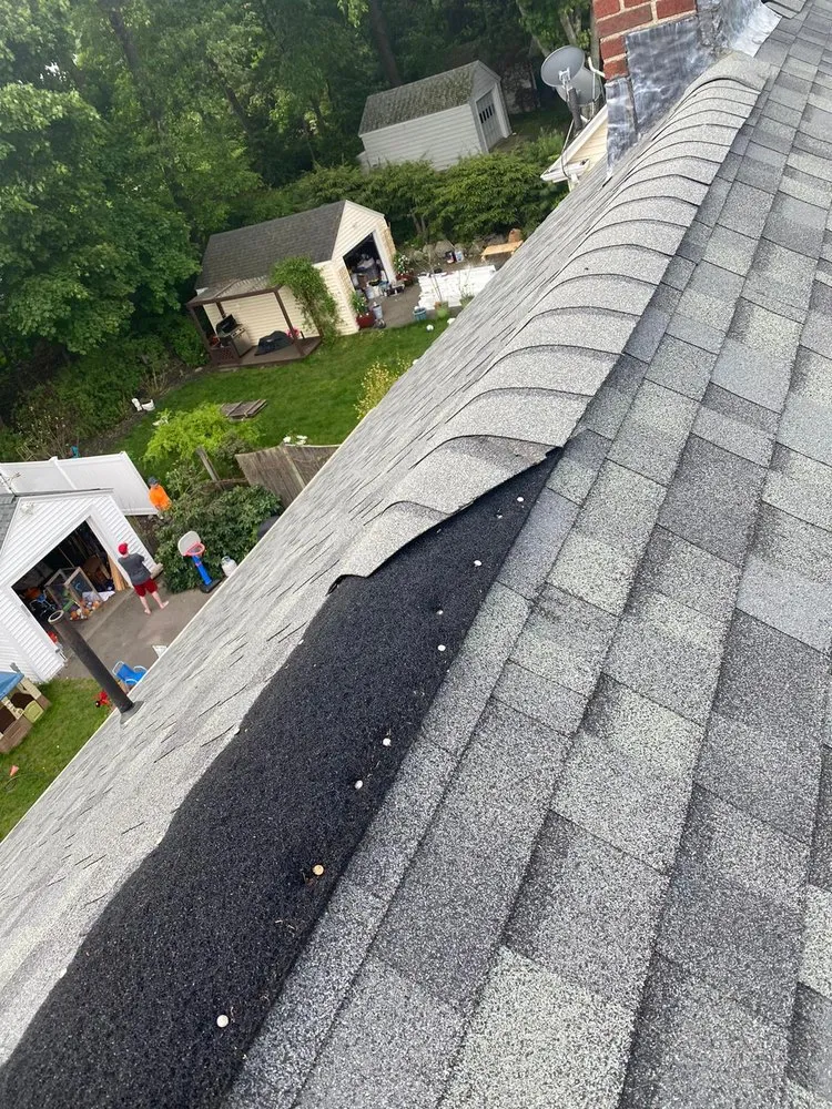 Slide of Millers Pro Roofing & Siding