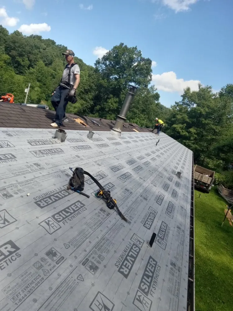 Slide of Millers roofing & repairs