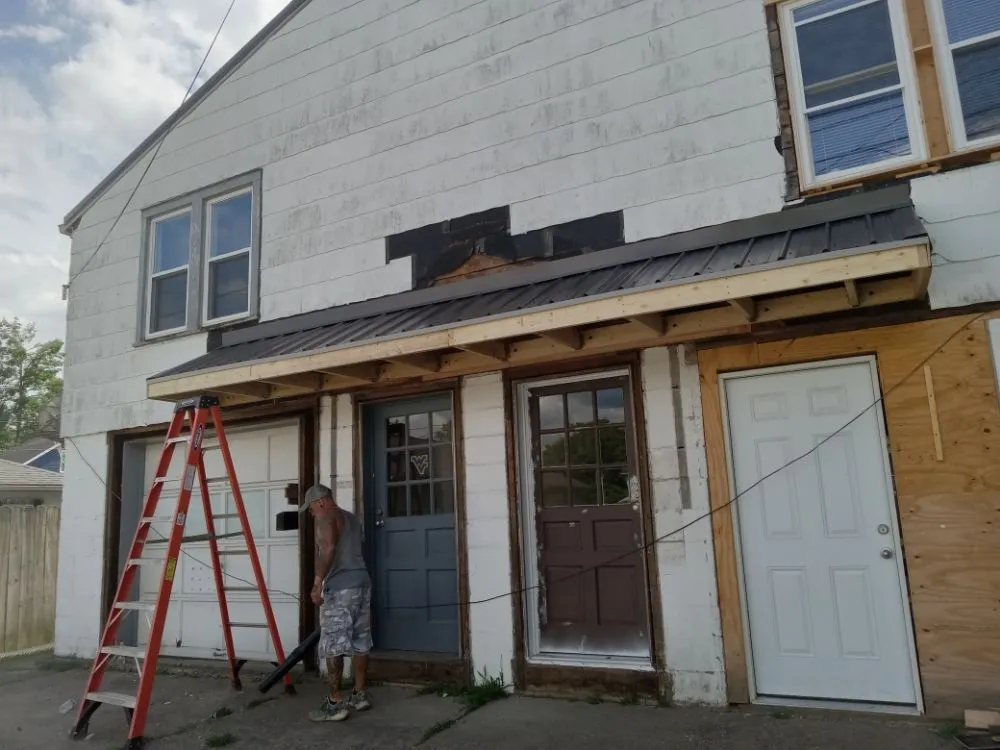 Slide of Millers roofing & repairs