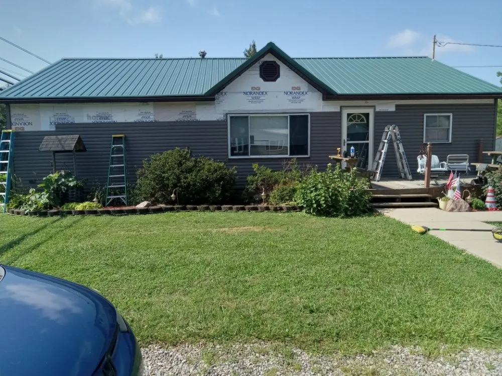 Slide of Millers roofing & repairs