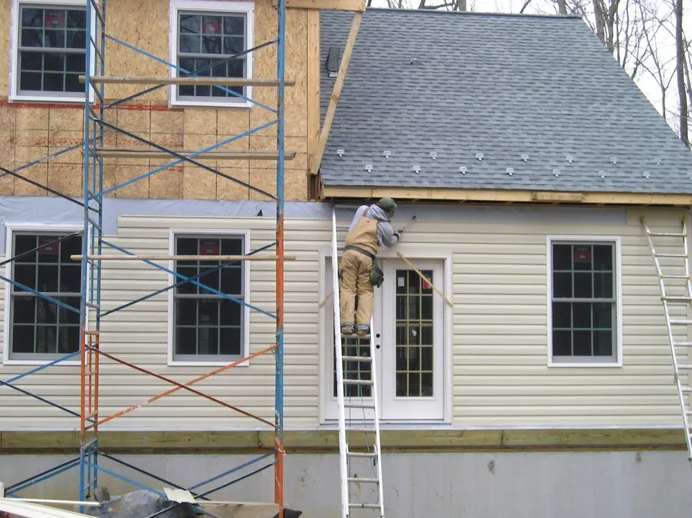 Licensed roof installation for residential properties in Wellsville, PA by Miller's Roofing
