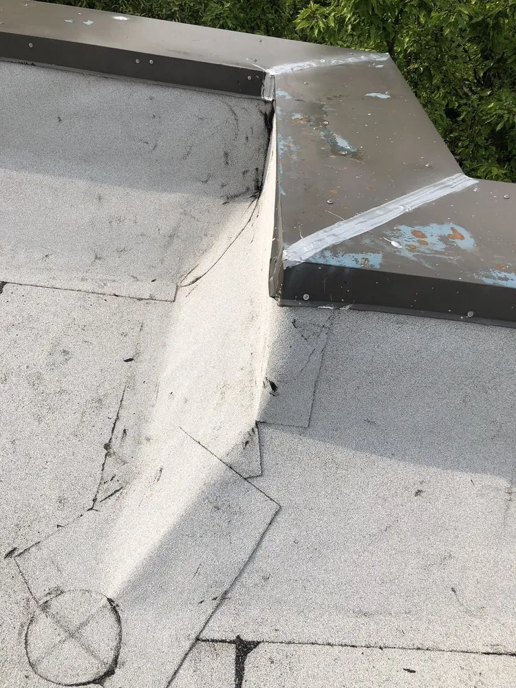 Slide of Miller's Sealcoating & Flat Roof Specialist