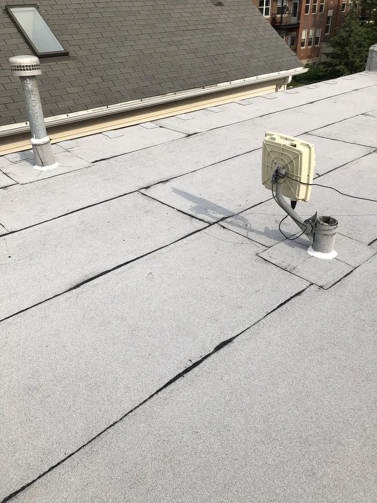 Slide of Miller's Sealcoating & Flat Roof Specialist