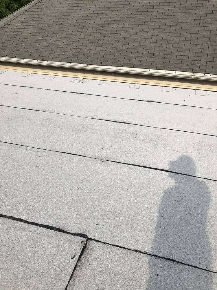 Slide of Miller's Sealcoating & Flat Roof Specialist