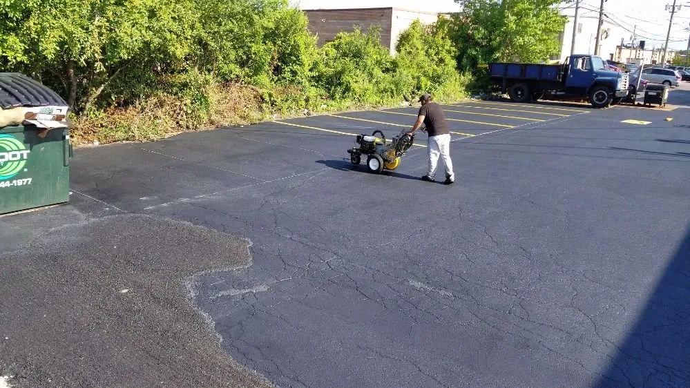 Slide of Miller's Sealcoating & Flat Roof Specialist