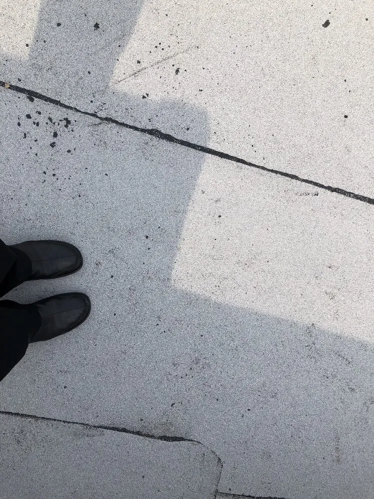 Slide of Miller's Sealcoating & Flat Roof Specialist