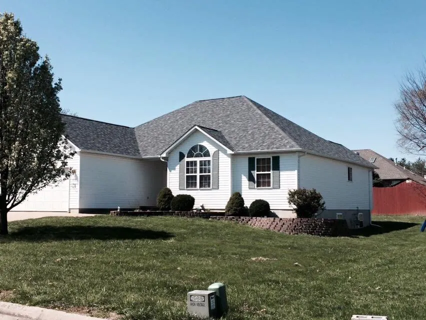 Licensed shingle roofing service for homes in St. Louis, MO by Mills Construction