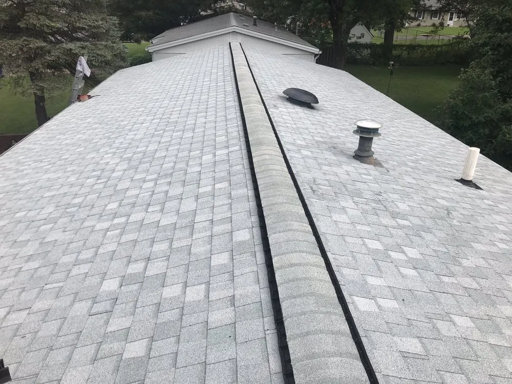 Licensed storm damage roof repair with free inspection across St. Louis, MO - Mills Construction