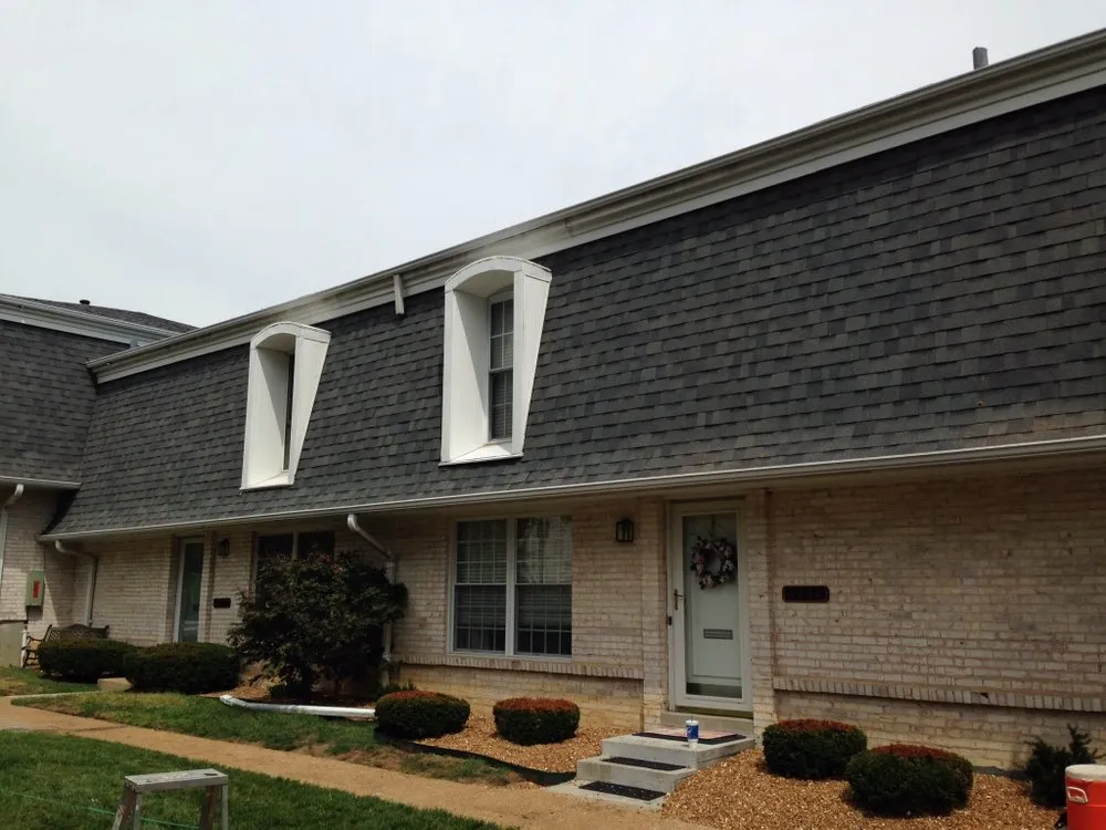 Reliable flat roof repair after storm damage in St. Louis, MO by Mills Construction