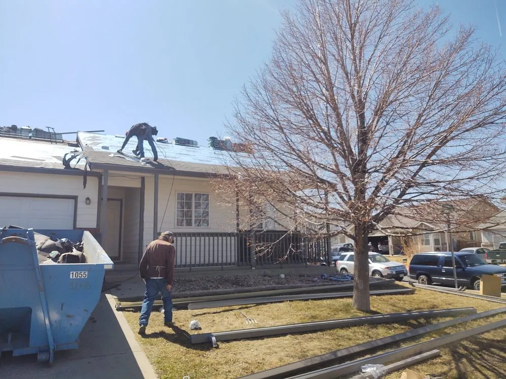 Slide of Mills Roofing Company