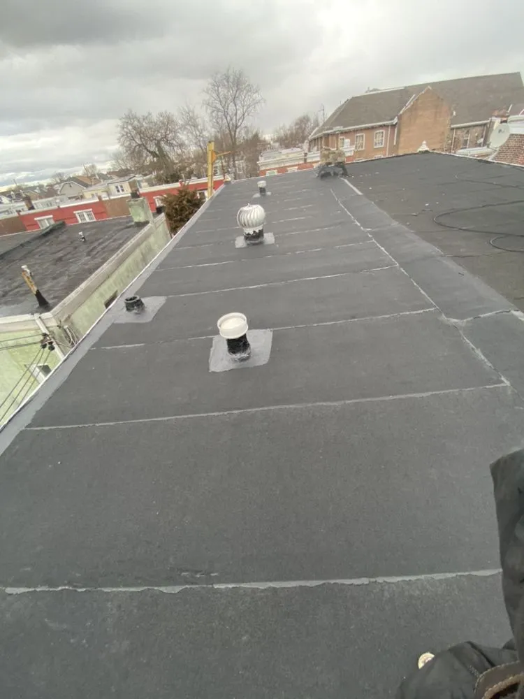 Slide of Mimm’s Roofing