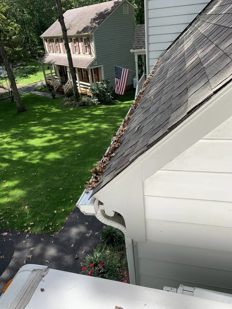 Professional roof leak repair for homes in Powhatan, VA by Mind in the Gutter