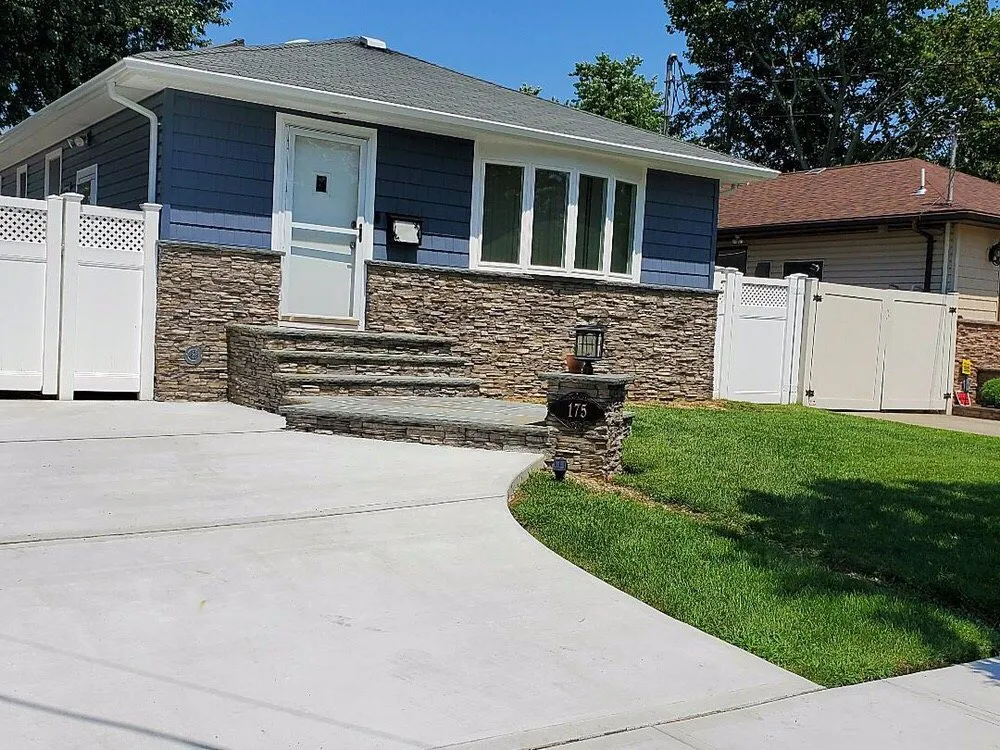 Slide of Mineola Roofing & Siding Corp