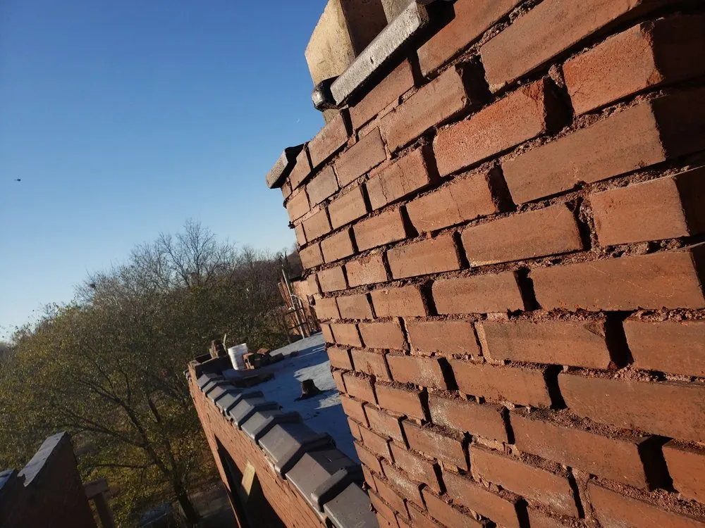 Licensed residential roofing service with free inspection in St. Louis, MO by Minority Tuckpointing