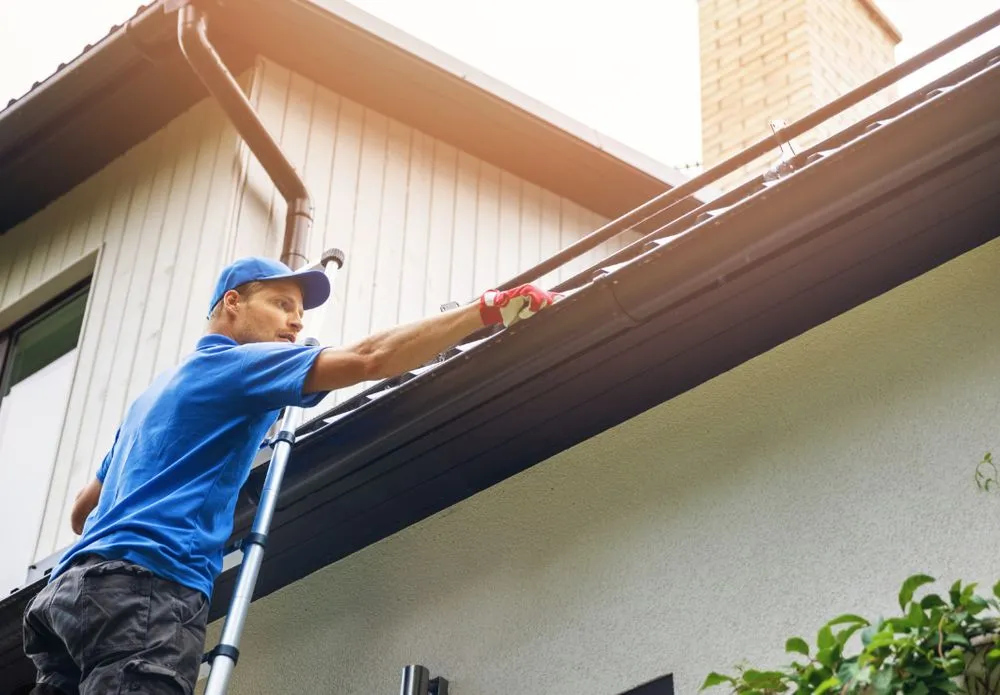 Slide of Minuteman Roof and Gutter Cleaning