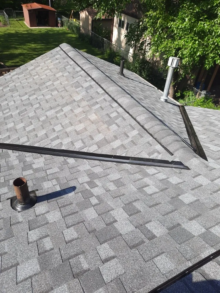 Slide of Miracle Roofing & Siding