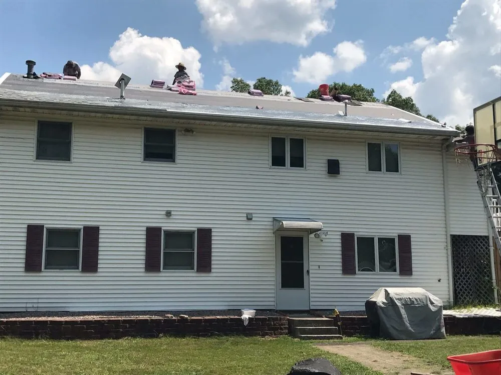 Slide of Mirzo Roofing & Construction