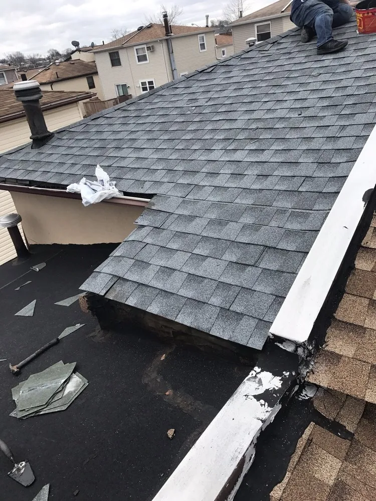 Slide of Mirzo Roofing & Construction