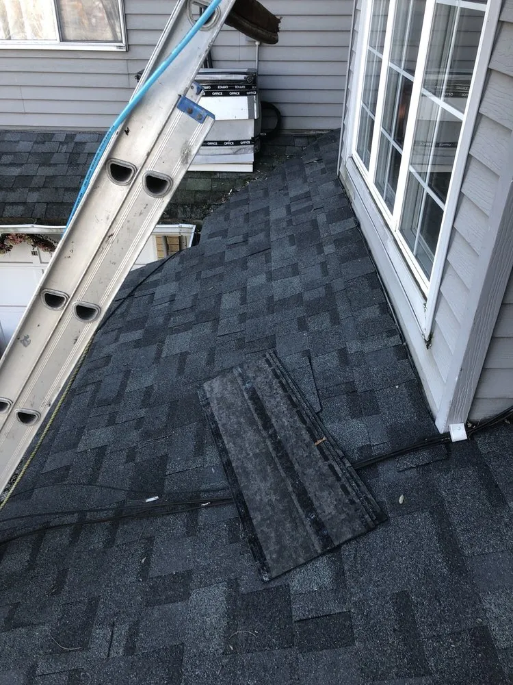 Slide of Mirzo Roofing & Construction