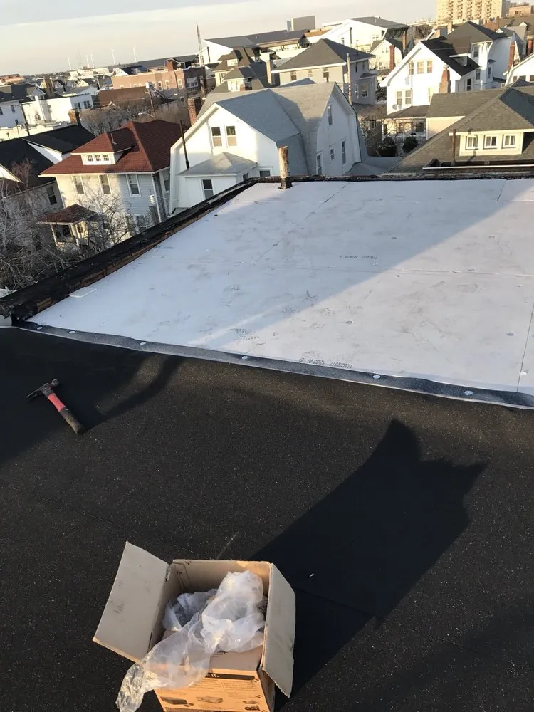 Slide of Mirzo Roofing & Construction