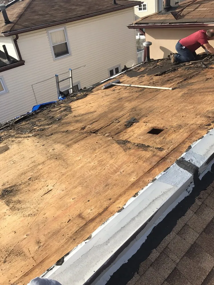 Slide of Mirzo Roofing & Construction