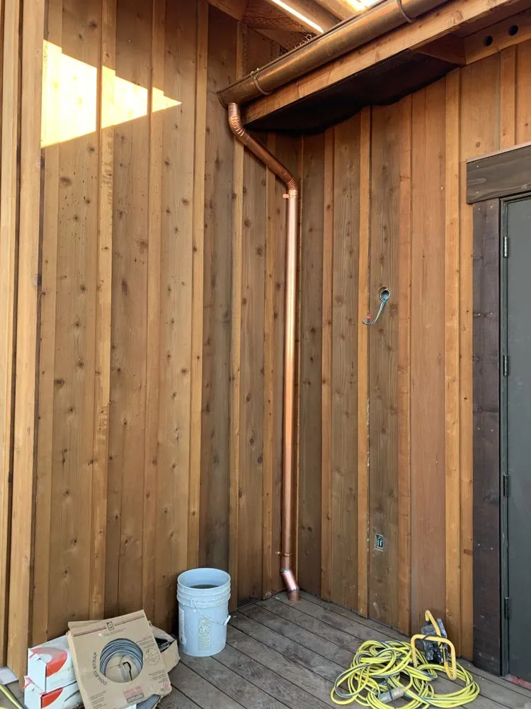 Slide of Mistah Seamless Gutters